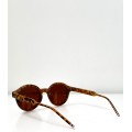 Στρόγγυλα γυαλιά ηλίου με ασημί λεπτομέρεια (Λεοπάρ)
